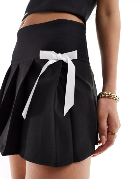 Kaiia pleated bow detail mini skirt co-ord in black