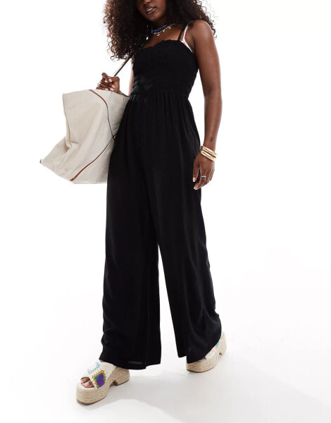 ASOS DESIGN shirred bandeau beach jumpsuit in black