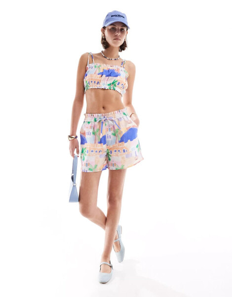 ASOS DESIGN pull on short with ruffle detail in scenic print co-ord