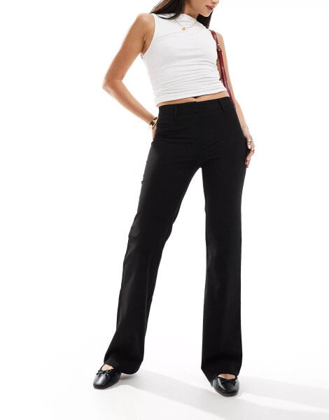 Weekday Kate low waist slightly flared trousers in black