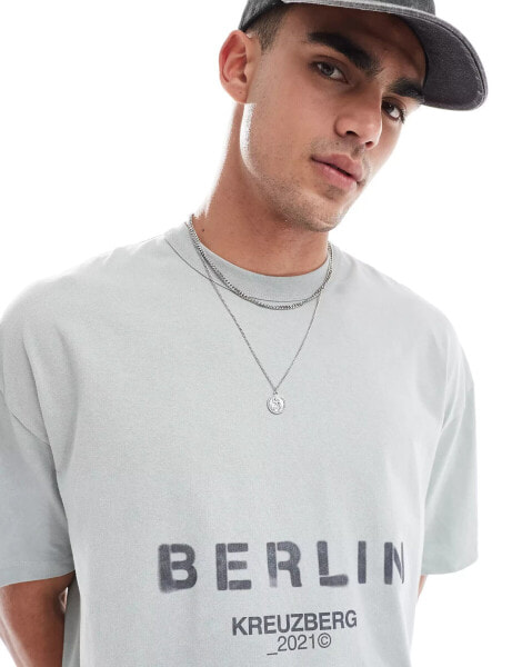 ASOS DESIGN oversized t-shirt in washed grey with Berlin text print