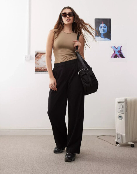 Weekday Drew mid waist slouchy trousers with front pleats in black