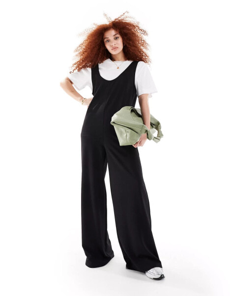 ASOS DESIGN 2 in 1 pinny jumpsuit with wide leg in black