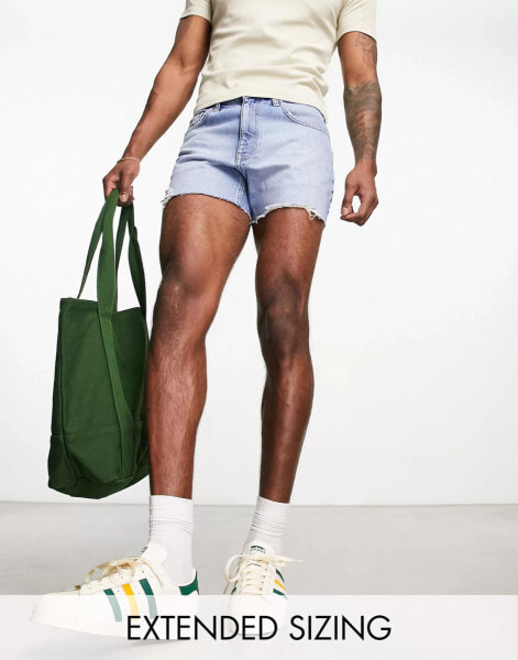 ASOS DESIGN slim shorter length ripped denim shorts in light blue wash