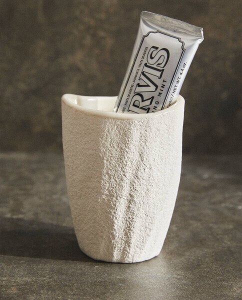 Textured ceramic toothbrush holder