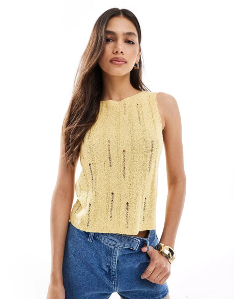 ASOS DESIGN knitted tank top in boucle yarn with ladder stitch detail in yellow