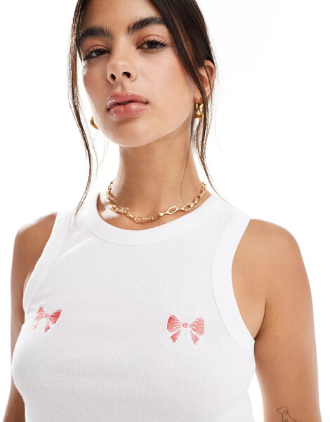 Pieces embroidered bow front racer neck vest top in white