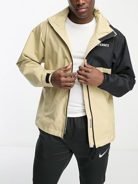 adidas Terrex rain ready jacket in beige