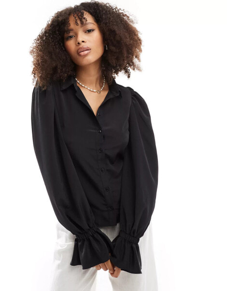 ASOS DESIGN volume sleeved soft shirt with ruffle cuffs in black