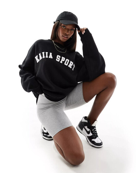 Kaiia sport logo oversized sweatshirt in black