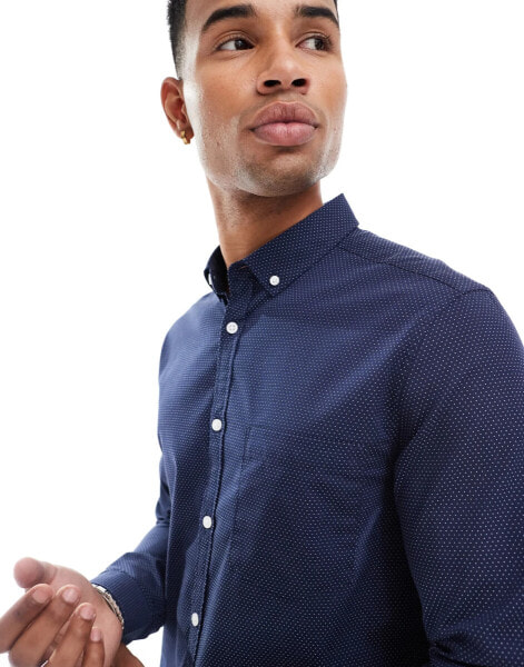 ASOS DESIGN slim shirt with button down collar in navy polka dot