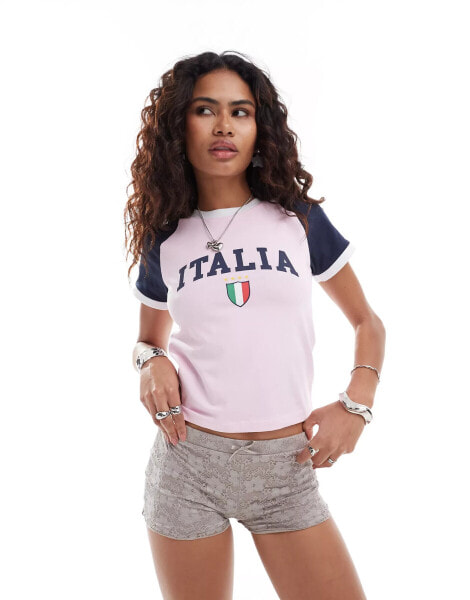 ASOS DESIGN raglan baby tee with italia football graphic in navy and pink