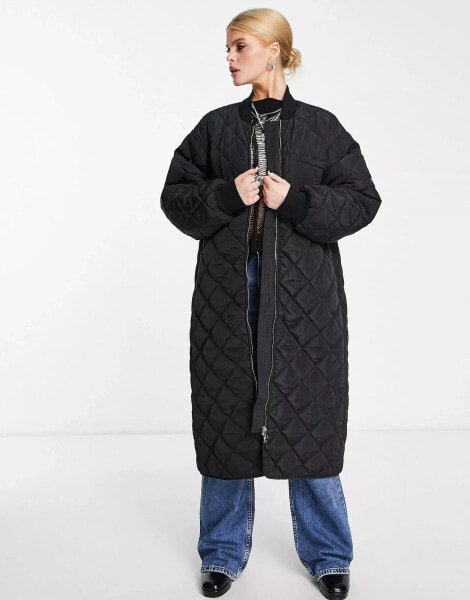 Edited maxi quilted bomber coat in black