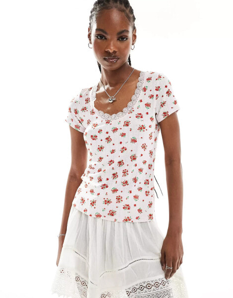 Monki pointelle top with scoop neck and lace trim in pink and red floral print