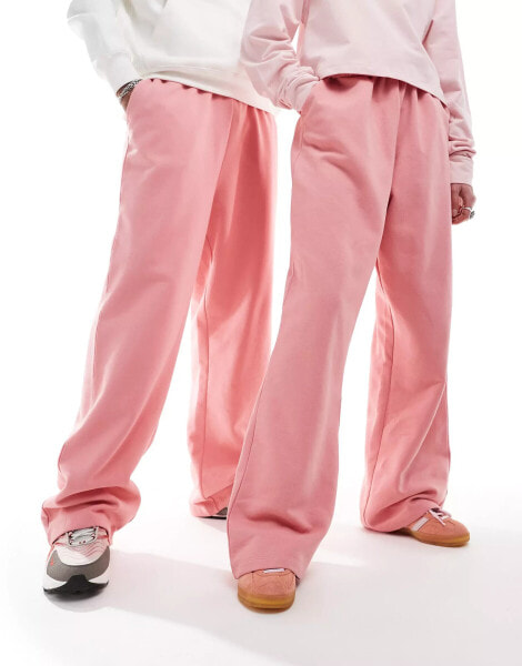 COLLUSION Unisex relaxed joggers in pink