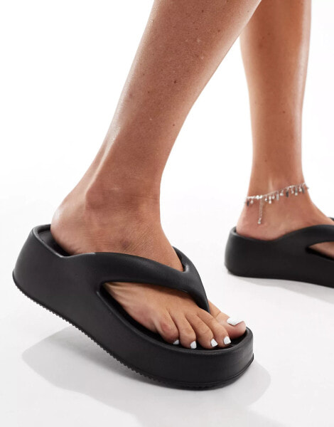 Truffle Collection wedge thong toe pool sandals in black