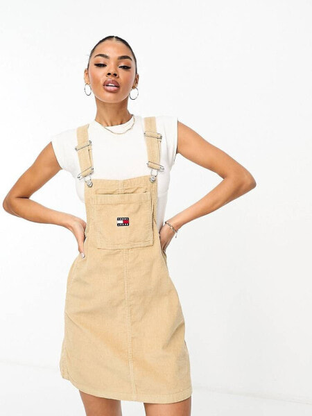 Tommy Jeans logo corduroy pinafore dress in sand