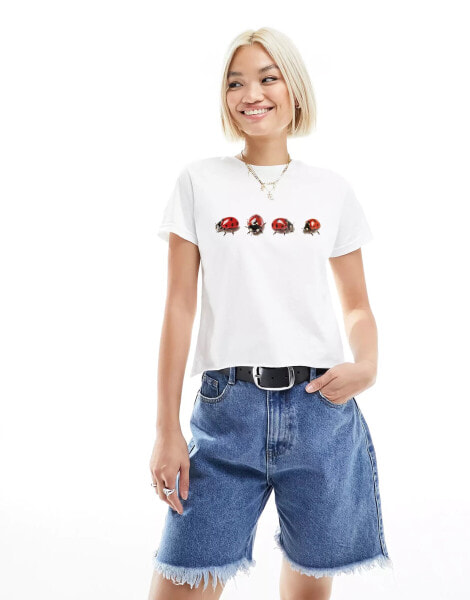 ASOS DESIGN baby tee with ladybird graphic in white