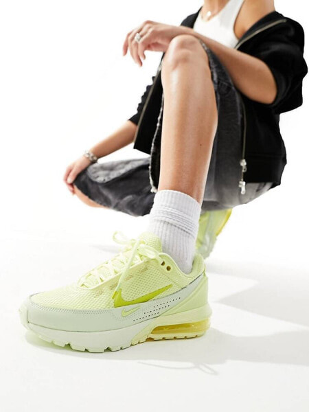 Nike Air Pulse trainers in luminous green