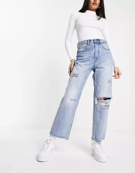 Stradivarius straight cropped jean with rips in medium blue