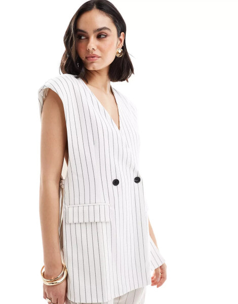 ASOS DESIGN sleeveless tailored blazer with tie sides in the white stripe