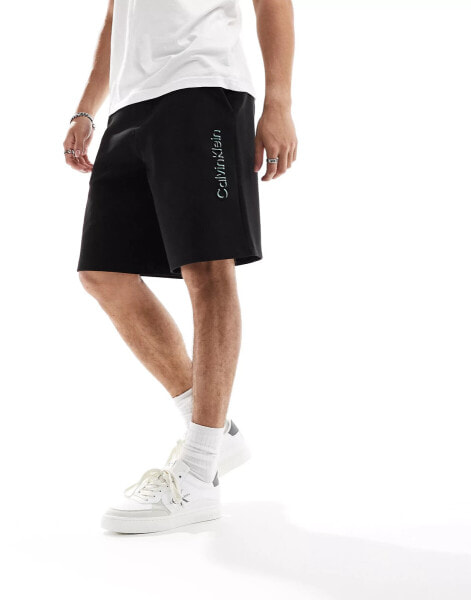 Calvin Klein shadow embossed logo jersey shorts in black