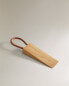 Wooden leather doorstop