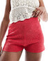 SNDYS embossed knitted shorts in red