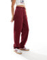 ASOS DESIGN dad jeans with self belt in burgundy