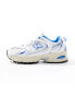 New Balance 530 trainers in white and light blue