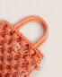 Raffia mini beach bag with little balls