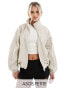 ASOS DESIGN Petite track jacket with piping detail in stone