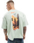 ASOS DESIGN oversized boxy t-shirt with mountain back print in green