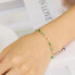 Fine gold-plated bracelet with green beads