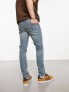 ASOS DESIGN skinny jeans with stitch detail in y2k light wash blue