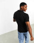 Tommy Jeans slim placket short sleeve polo shirt in black