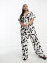 Vero Moda Curve wide leg jumpsuit in mono abstract print