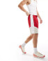 ASOS DESIGN longer length short in red nylon and white stripe detail