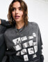 COLLUSION Unisex acid wash lone sleeve sweat in black with photographic print