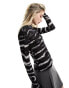 Vero Mod long sleeved sheer top with lettuce edge in mono spray print