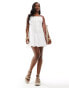 In The Style cami drop waist dress with pleated hem in white