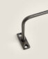 Dark metal towel rack