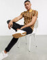 ASOS DESIGN skinny polo in brown vertical stripe with zip neck