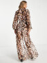 ASOS DESIGN cut out plunge jumpsuit with raffia buckle in leopard print