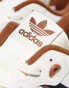 adidas Originals Rivalry Low trainers in white and brown