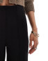 Vero Moda Tall pleat front wide leg trousers in black