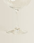 Raised crystalline wine glass