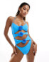 Candypants cut out swimsuit in baby blue with flower corsage detail