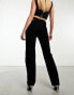 ASOS DESIGN mid rise straight jean with cut out waistband in washed black