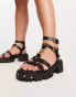 ASOS DESIGN Wide Fit – Forrest – Flache Sandalen aus Leder in Schwarz mit Riemen und dicker Sohle